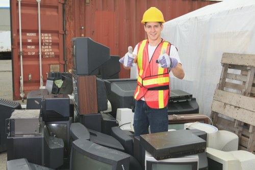 Team members handling a house clearance in a residential property