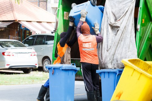 Commercial waste removal trucks in Heston