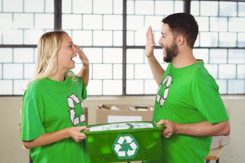 Professional office clearance team removing furniture